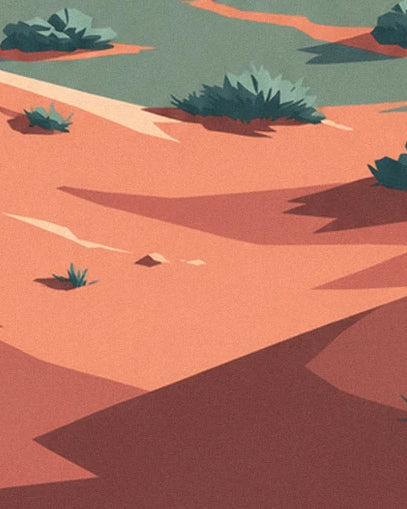The orange sand dunes and their brown shadows, with a few scattered green bushes