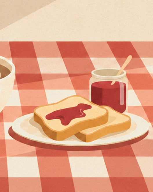 The 2 slices of bread with strawberry jam on a plate, with the jar and its wooden spoon