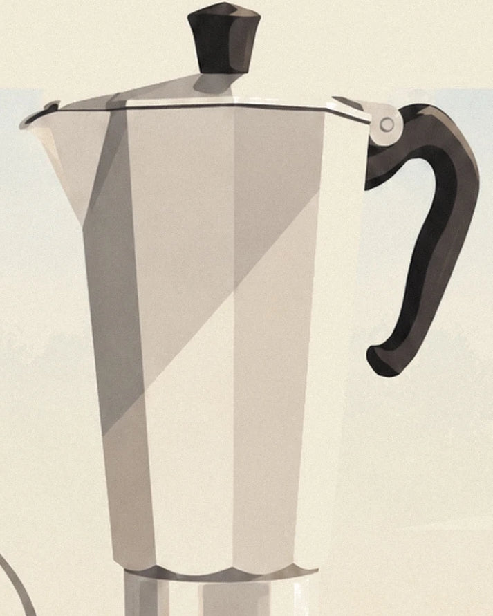 Une cafetière italienne aux facettes argentées, avec une grande poignée noire