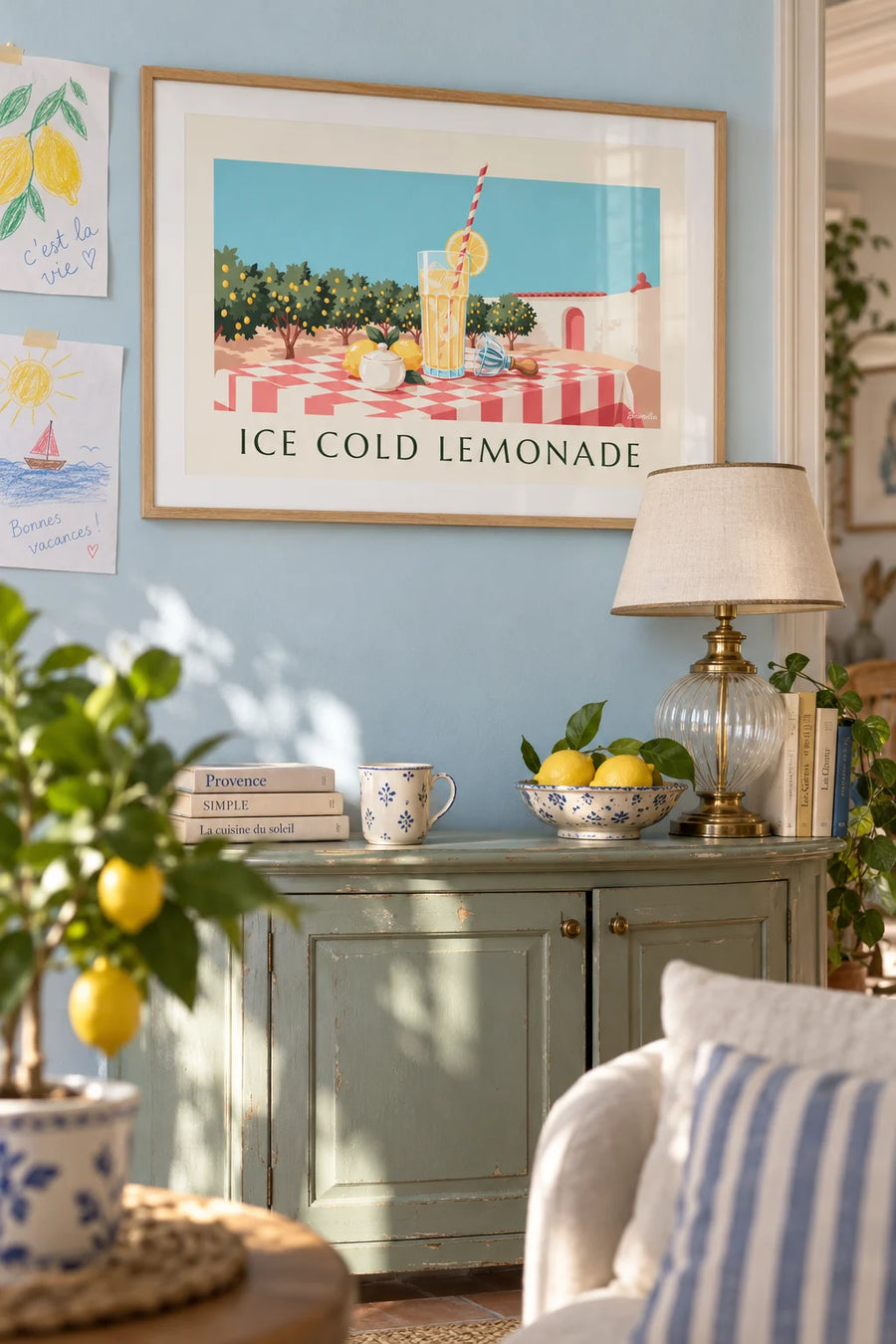 Poster of a glass of iced lemonade on a village terrace: framed on the wall