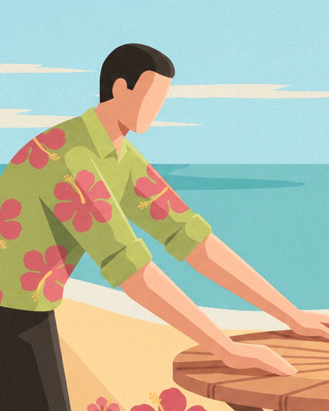 The waiter in a green shirt with pink hibiscus flowers, leaning over the table facing the sea