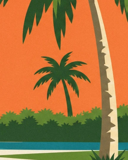 Palm trees and green bushes beneath an orange sky beside the pool