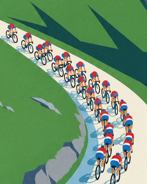 Le peloton en maillots rouges, blancs et bleus dans un lacet bordé de rochers
