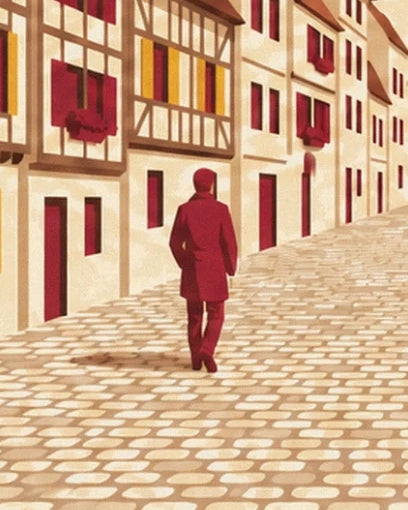 A walker seen from behind in a burgundy coat on the cobbled street lined with houses