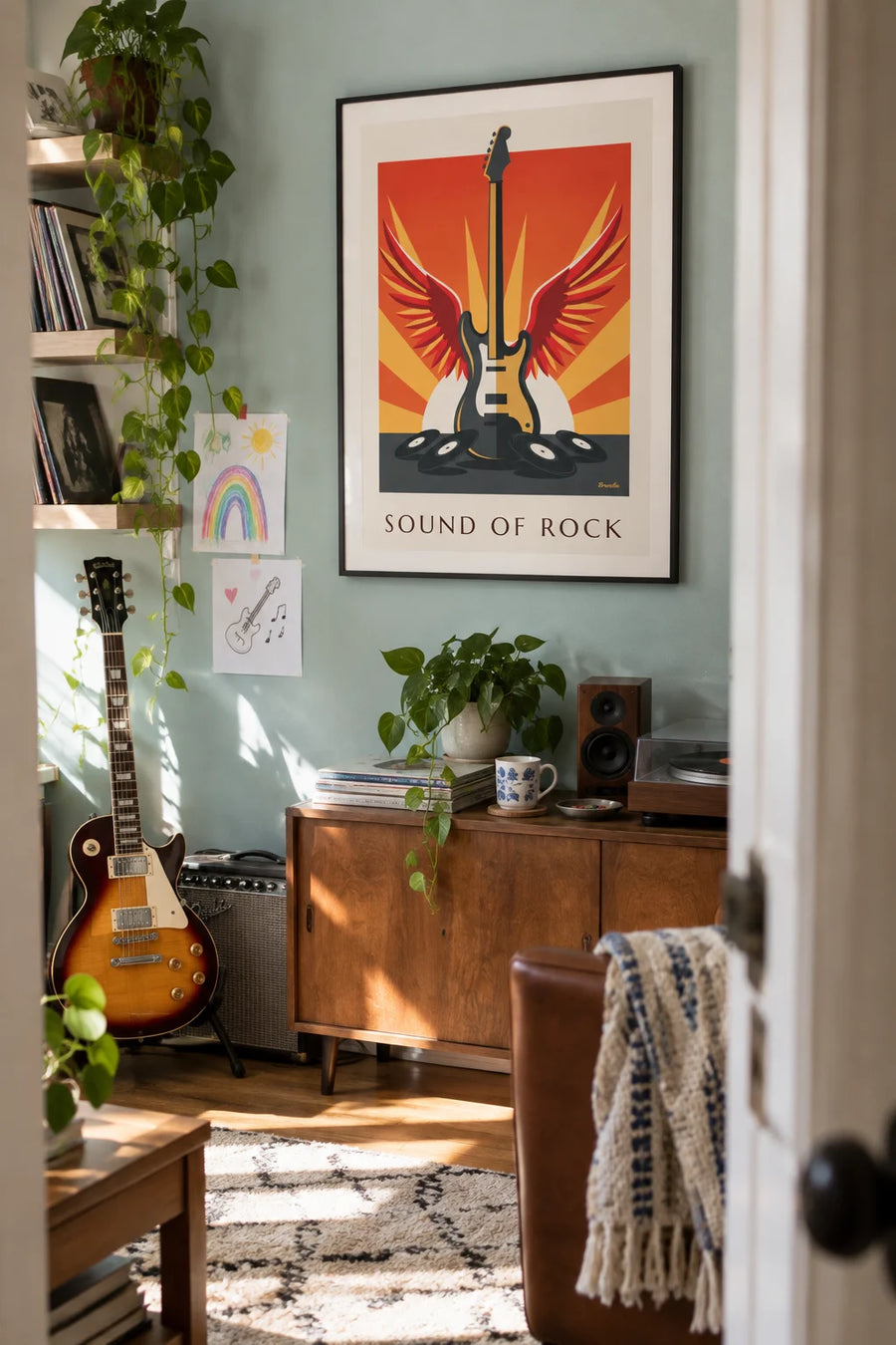 Affiche guitare électrique ailée et disques vinyles : encadrée au mur