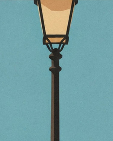 A black street lamp with a cream lantern against a turquoise-blue background