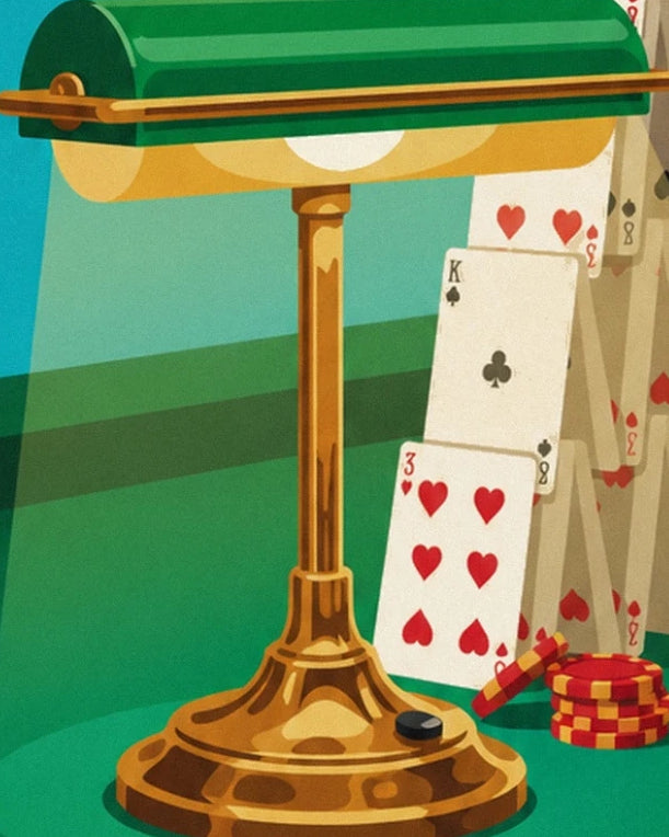 A green lamp with a gold base in front of the cards and stacks of chips