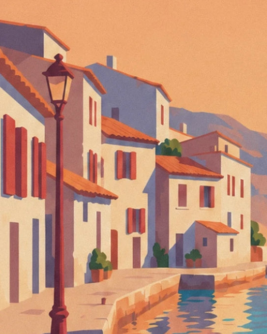 Pale houses with red shutters and a street lamp beside the quay