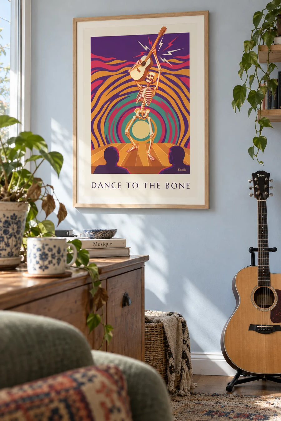 Poster of a dancing skeleton from a psychedelic rock night: framed on the wall