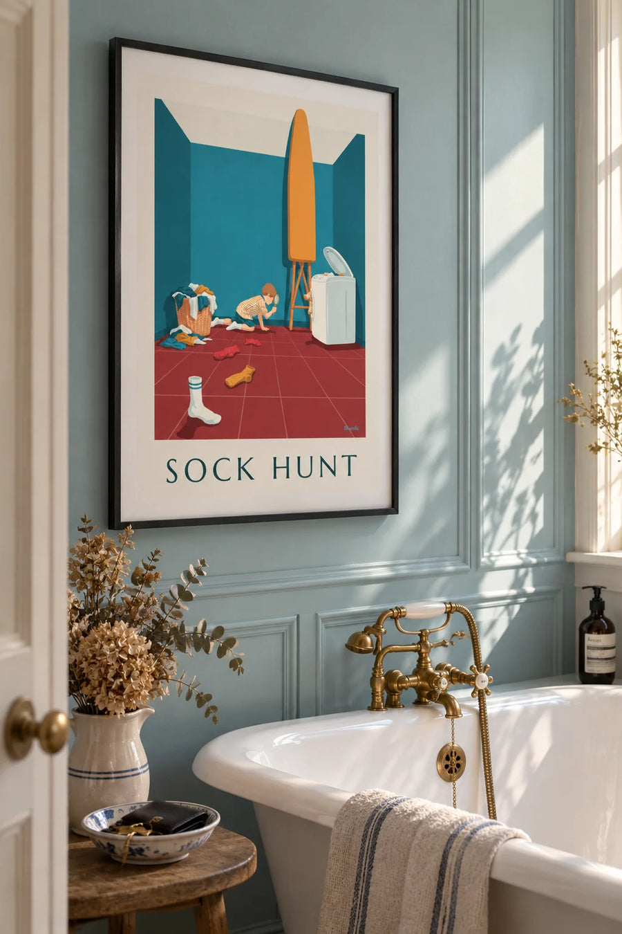 Humor poster of a boy with a magnifying glass on the trail of missing socks: framed on the wall