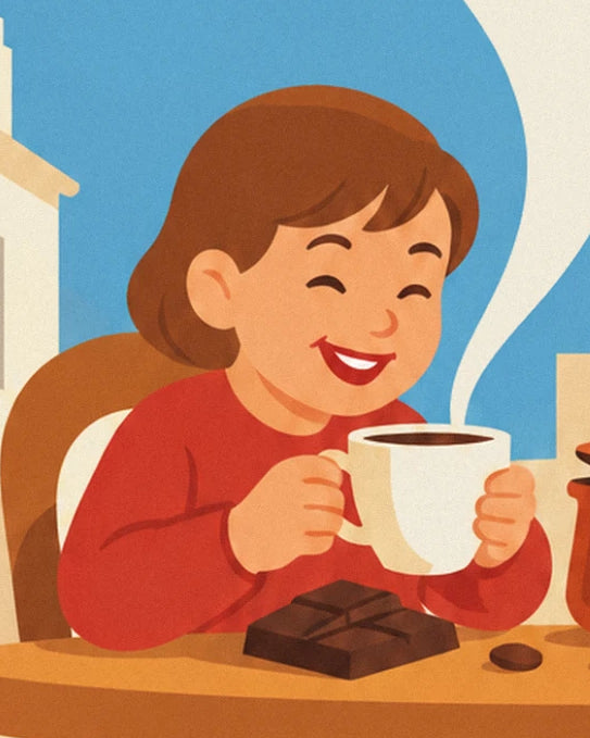 L’enfant souriant en pull rouge, sa tasse fumante et sa tablette de chocolat