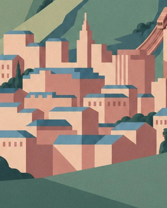 The pink buildings of Santiago with blue roofs at the foot of the green hill
