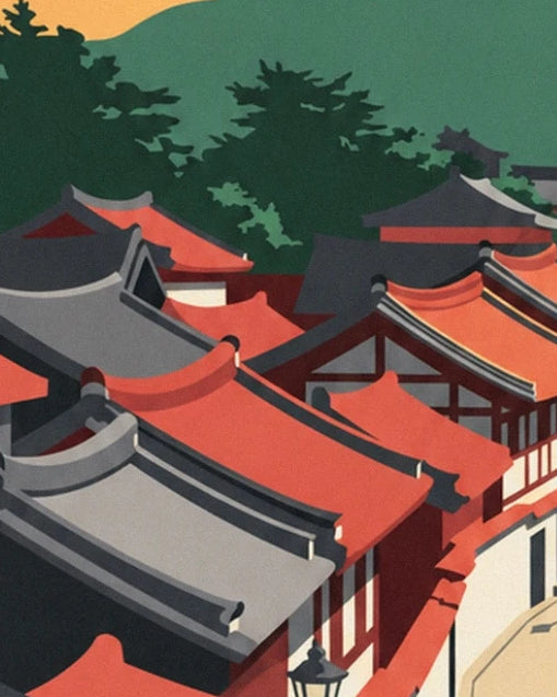 The red and grey roofs of Bukchon between timber-framed façades and green trees