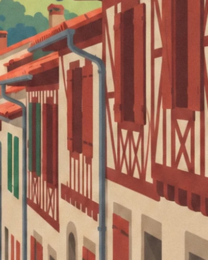 The white façades of Ainhoa with red timber framing and shutters