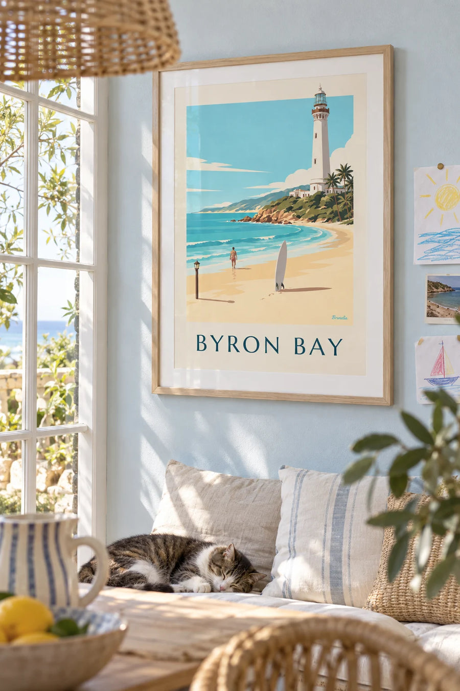 Poster of a surfboard and the Byron Bay lighthouse in Australia: framed on the wall