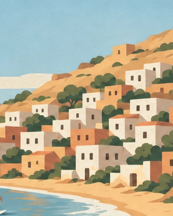 The white and ochre houses of Taghazout rising up the hillside beside the water
