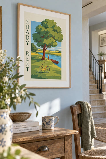 Poster of a bicycle in the shade of a tree by the river: framed on the wall