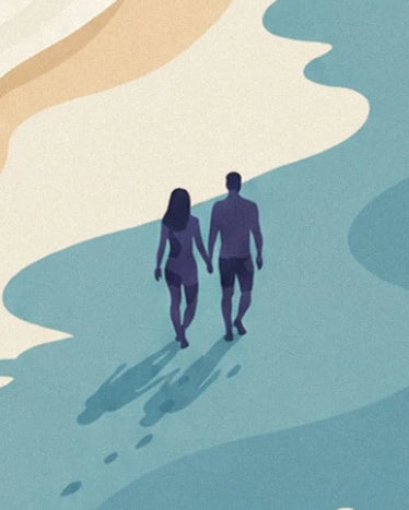 Un couple main dans la main au bord de l'eau, avec ses ombres allongées sur le sable
