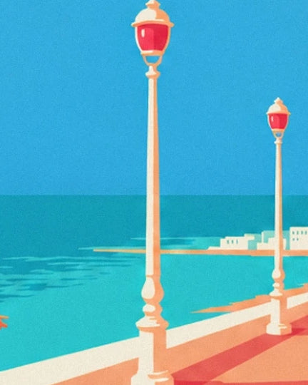 The 2 cream lamp posts with red lanterns on the promenade facing the sea