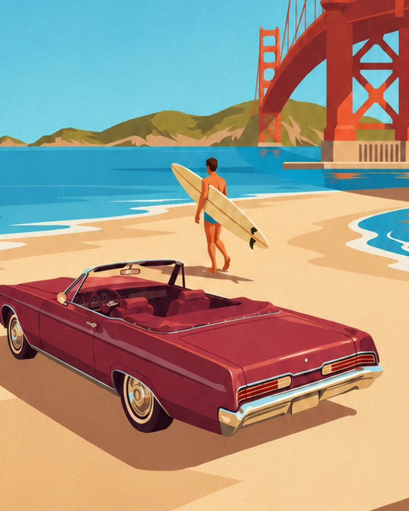 The surfer and his cream board in front of the burgundy convertible on the beach