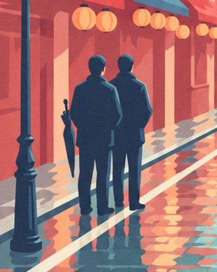 The 2 passers-by in dark coats near the street lamp, beneath the orange lanterns
