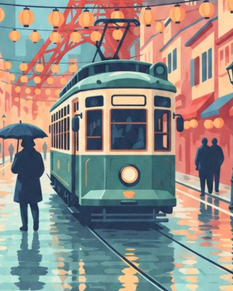 The green and cream tram on the wet tracks, between an umbrella and lanterns