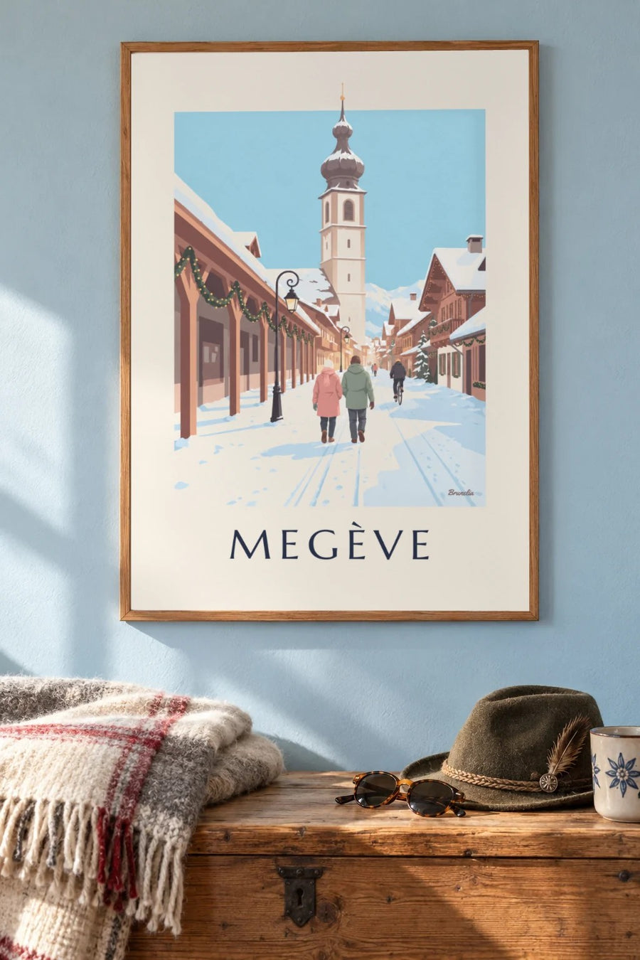 Juliste Megèvestä, kävelykadusta ja kellotornista : kehystettynä seinällä