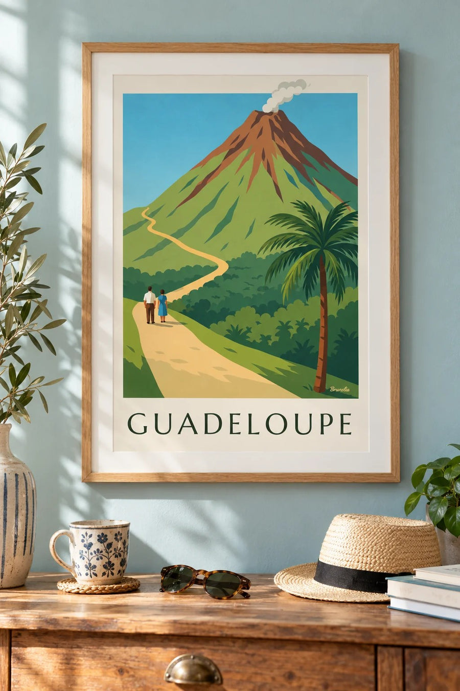 Guadeloupen La Soufrièren tulivuori -juliste : kehystettynä seinällä
