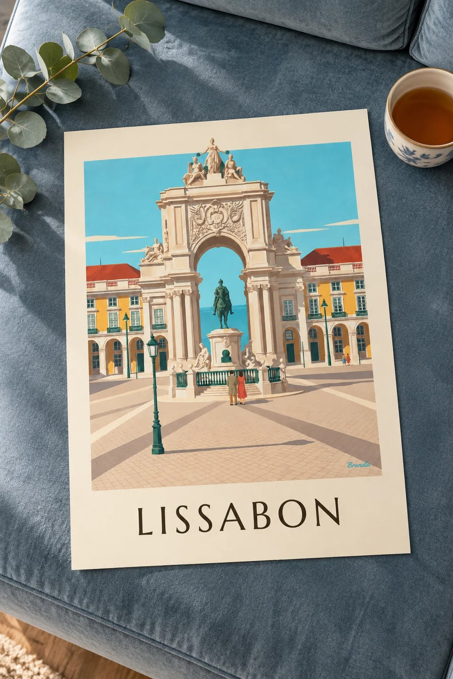Juliste Praça do Comércio ja Rua Augustan kaari Lissabonissa: pöydällä