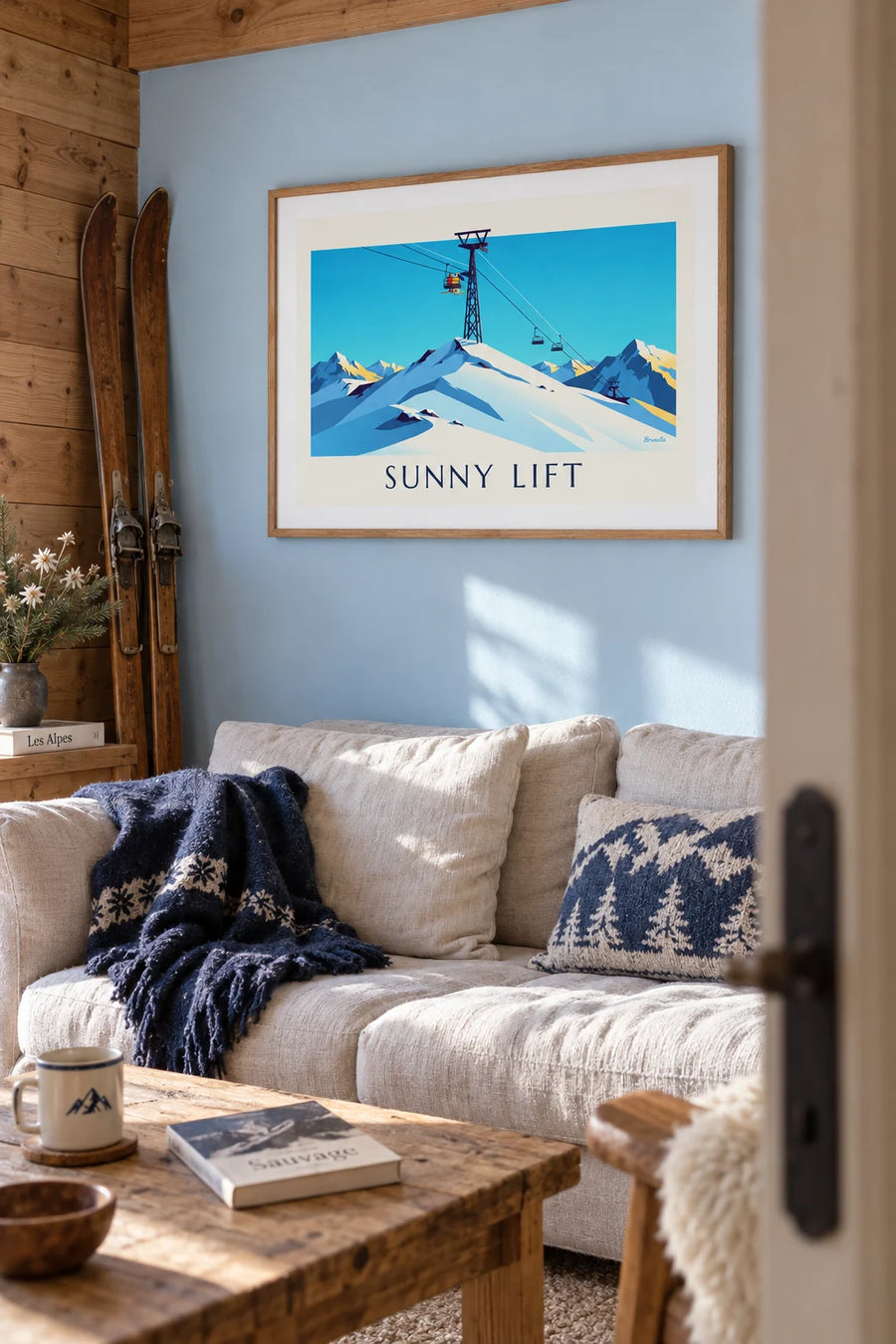Poster of skiers on a chairlift in the sun: framed on the wall