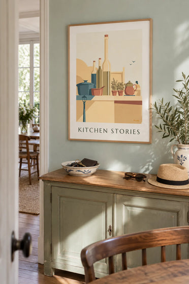 Poster of saucepans, painted teapots and kitchen bottles: framed on the wall