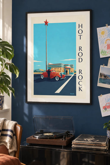 Poster of a hot rod car in front of a rock and roll diner: framed on the wall