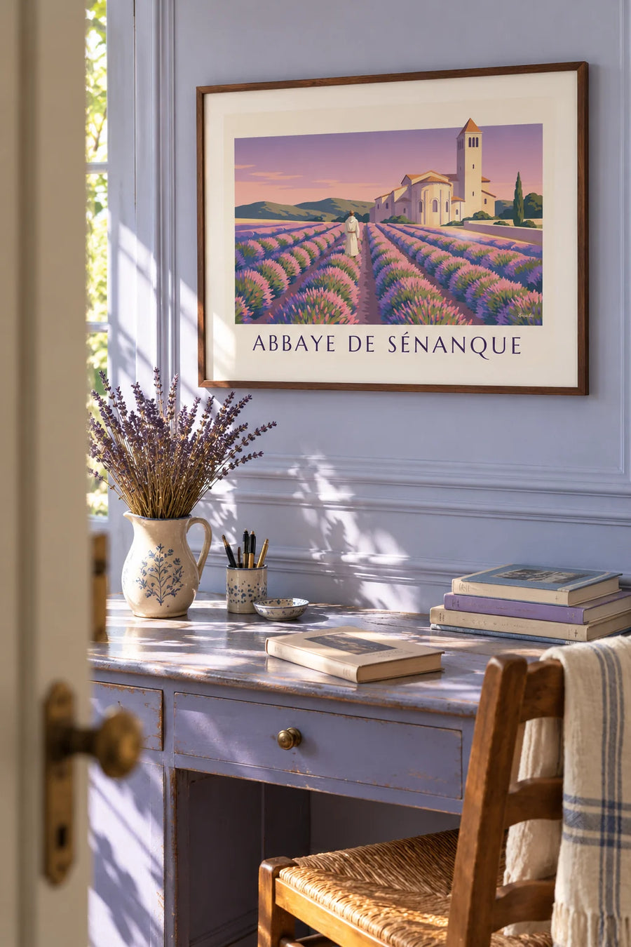 Poster of a monk walking through the lavender at Sénanque Abbey: framed on the wall